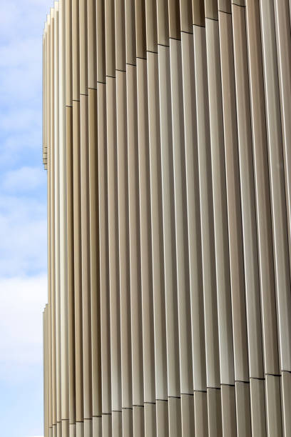 istock Closeup wall of modern townhouse with metal stripes, background with copy space 2202925607