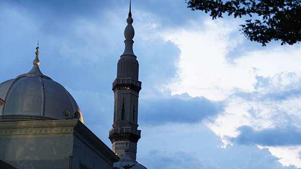istock Mosque dome and tower in the afternoon with blue sky background 2202928261