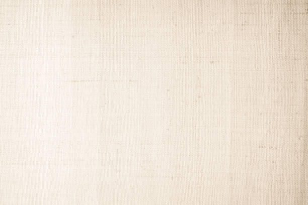 istock Brown sackcloth woven texture background in natural pattern. Jute hessian burlap, linen background in light beige cream color blank. Weaving canvas fiber line cotton cloth textured as organic. 2202934100