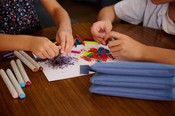 istock Children creating colorful art pieces 2202935489
