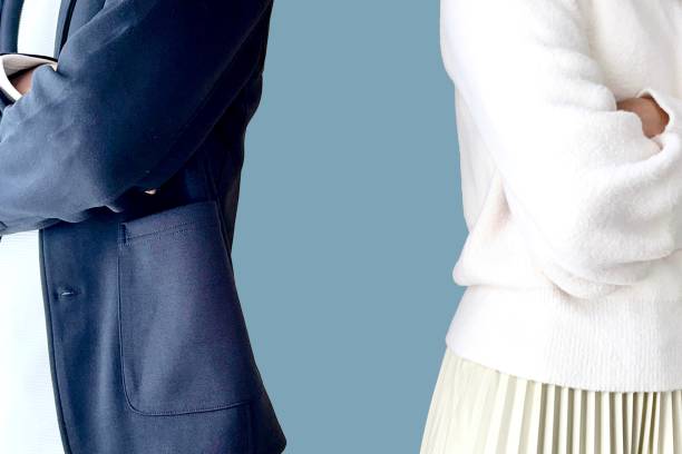 istock Man and woman arguing and turning their backs 2202939599