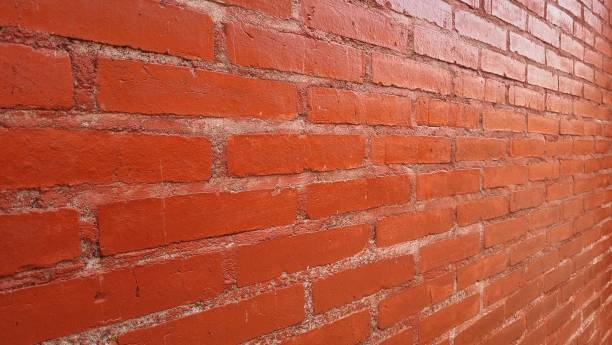 istock Big full frame background of detailed red brick wall with copy space. 2202954177
