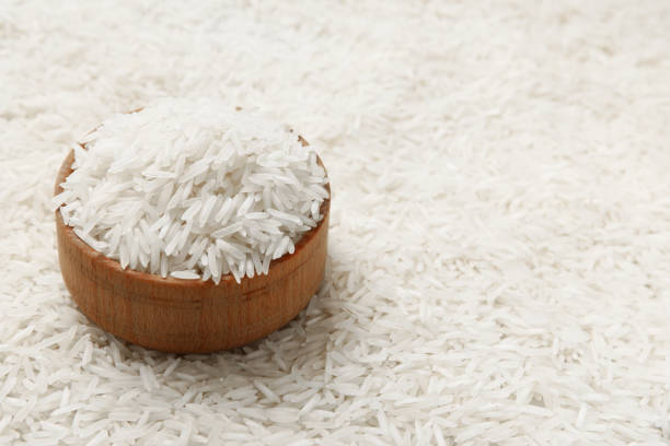 istock Bowl on raw basmati rice, closeup. Space for text 2202966704