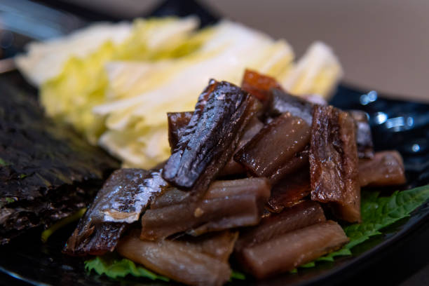 istock napa cabbage and half-dried saury with dried laver on the dish 2202969421