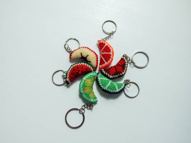 istock Bead colorful key chains on a white background 2202976684