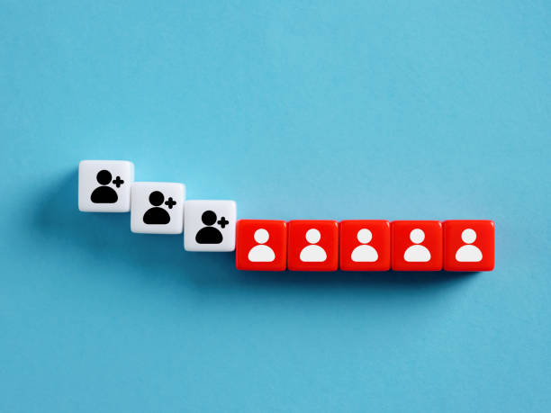 istock Dice changing from adding new members to existing members on blue background 2202981668