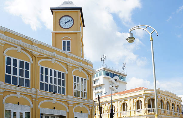 istock Historic Yellow Clock Tower Building in Phuket island, Thailand. 2202983036