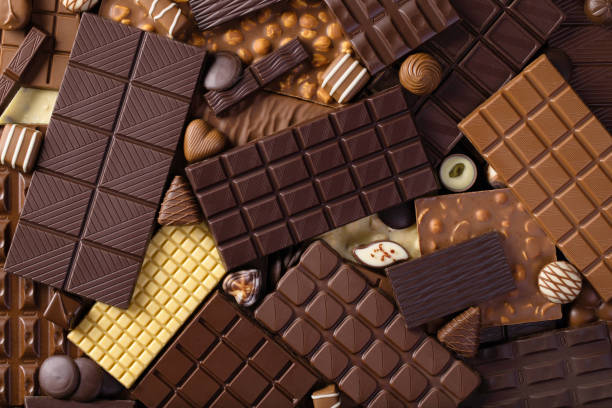 istock assorted chocolate bar and candy background, delicious food for dessert 2202988275