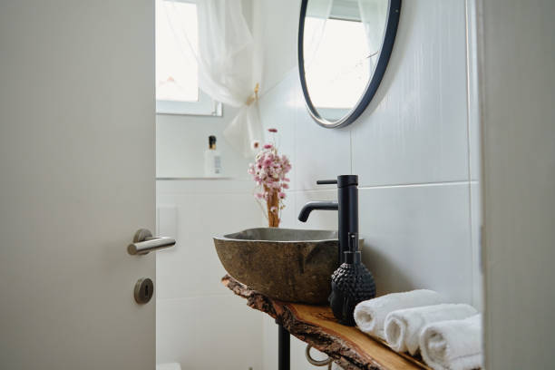 istock Bathroom Interior with Natural Stone Basin and Minimalist Decor 2202988500