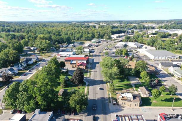 istock Aerial view of a small town with greenery 2202990805
