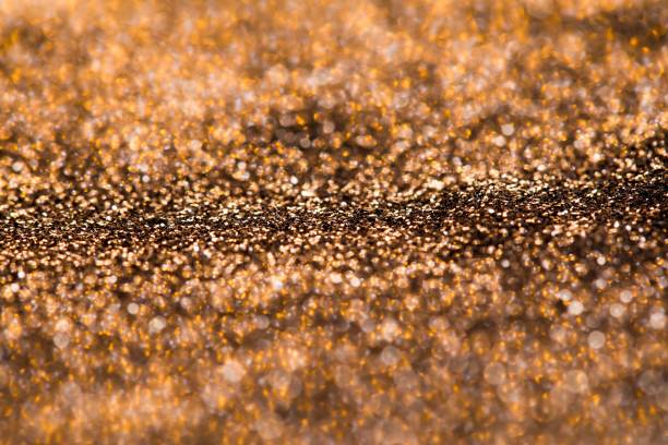 istock Shimmering Golden Glitter Close-Up 2202990871