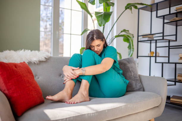 istock Nurse in Pain at Home 2202995049