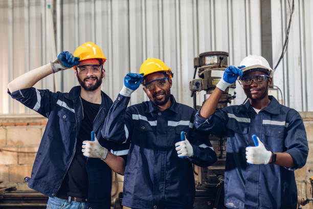 istock Workers Factory or Engineering work at factory site check up machine or products in site. Foreman or Technician checking Material or Machine on Plant. Heavy industry factory concept. 2202996043