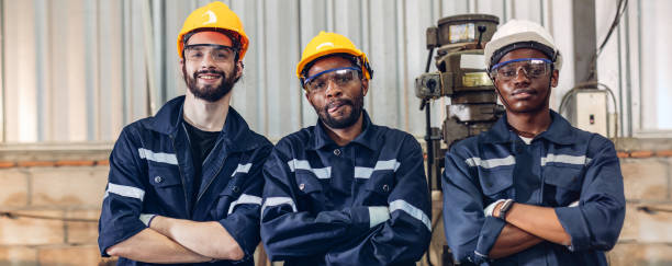 istock Workers Factory or Engineering work at factory site check up machine or products in site. Foreman or Technician checking Material or Machine on Plant. Heavy industry factory concept. 2202996046