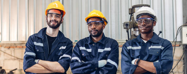 istock Workers Factory or Engineering work at factory site check up machine or products in site. Foreman or Technician checking Material or Machine on Plant. Heavy industry factory concept. 2202996051