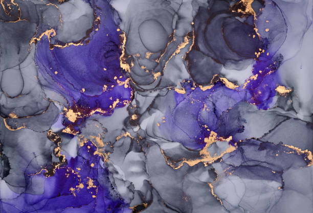 istock Current of translucent hues intertwine with metallic gold veins, shaping organic luxurious landscape. This fluid art, abstract liquid ink technique, light and shadow dance across free-flowing textures 2202997871