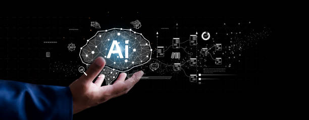 istock Chat with AI or Artificial Intelligence. Young businessman chatting with a smart AI or artificial intelligence using an artificial intelligence chatbot developed by OpenAI. 2202999731