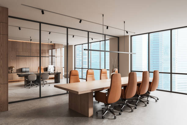 istock Modern office interior with large wooden conference table and ergonomic chairs. 3D Rendering 2203000480