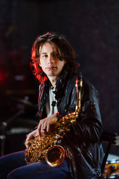 istock Portrait of a young saxophonist in a recording studio 2203003156