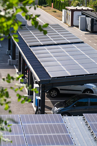 istock Parking space with solar panels on a roof. Solar canopy. 2203004040