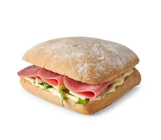 istock Sandwich isolated on the white table, cheese, lettuce, various vegetables. 2203010475