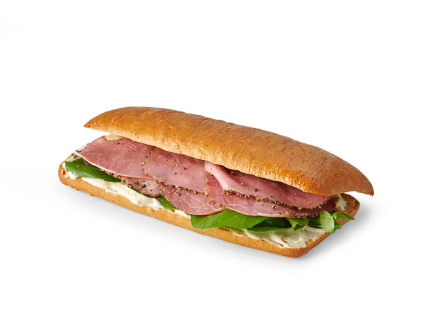 istock Sandwich isolated on the white table, cheese, lettuce, various vegetables. 2203010505