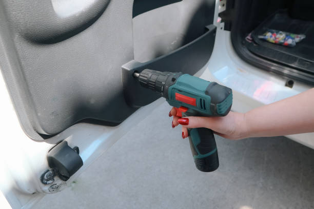 istock Car repair. We replace broken car trim panel fasteners. 2203010617
