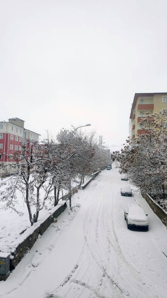 istock street after snowstorm. 2203011723