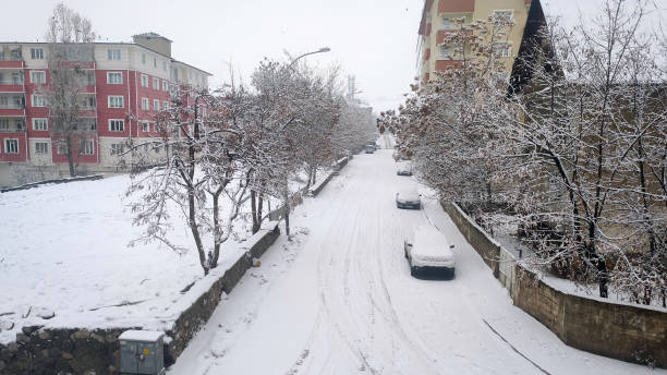 istock street after snowstorm. 2203011725