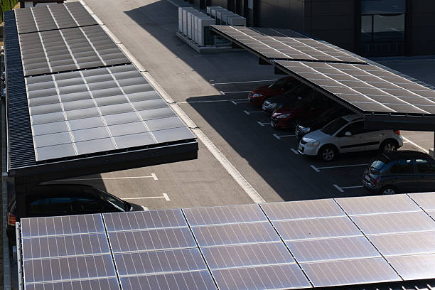 istock Parking space with solar panels on a roof. Solar canopy. 2203017232