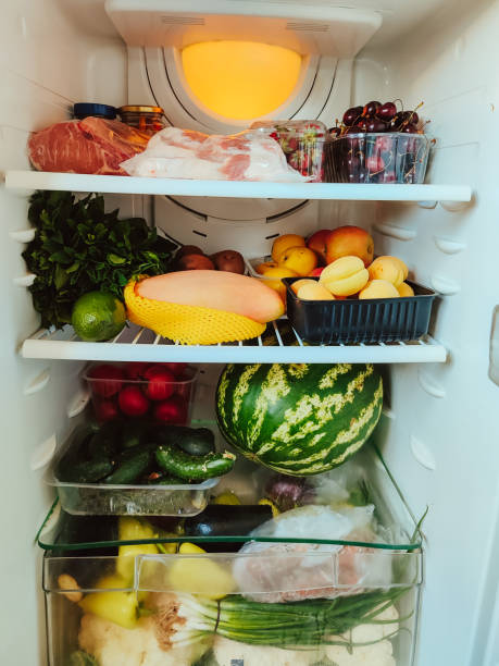 istock Open refrigerator full of many different products 2203017918