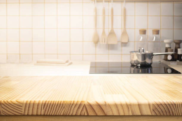 istock Wood counter,table top on blur minimal kitchen counter background.not ai generate 2203021127