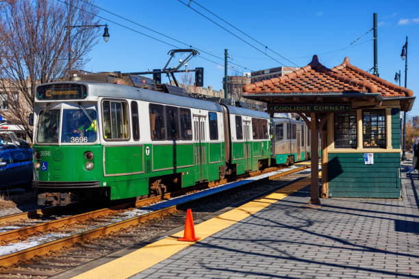 Brookline, Massachusetts, USA - February 14, 2025: A Cleveland Circle train at the Coolidge Corner train stop on the MBTA (Massachusetts Bay Transportation Authority) Green Line., on Beacon Street in Brookline, Massachusetts.