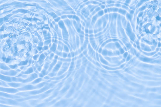 istock Water background,Sea blue water ripple surface texture with light effect use for Summer background banner,Top view Motion circle wave water in bathroom,Flat lay swimming pool with natural sunlight 2203026128