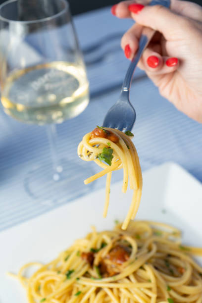 istock Spaghetti with sea urchins at the seaside restaurant 2203027363