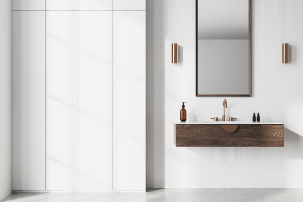 istock Modern bathroom interior with wooden floating vanity and minimalist design. 3D Rendering 2203027795