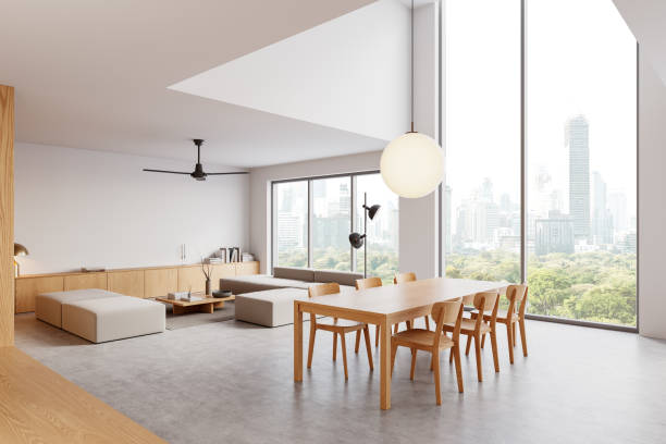 istock Modern minimalist living and dining space with natural lighting. 3D Rendering 2203028267