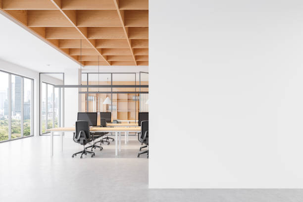 istock Modern open space office interior with wooden ceiling and glass partitions, featuring desks and chairs in a bright environment. 3D Rendering 2203028287
