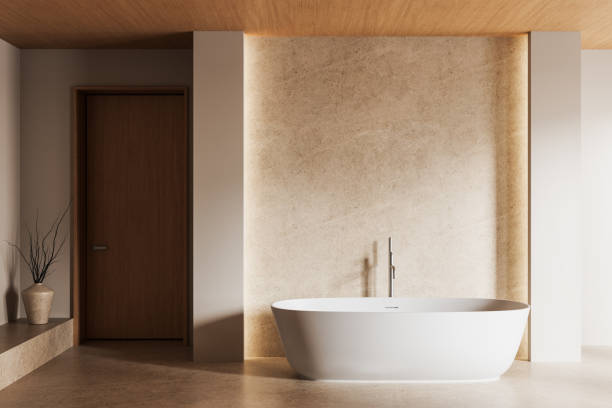 istock Modern minimalist bathroom interior with elegant bathtub and natural decor. 3D Rendering 2203028305