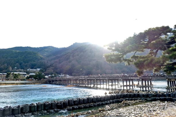 istock Togetsukyo Bridge with Sunlight Over a Scenic River 2203030509