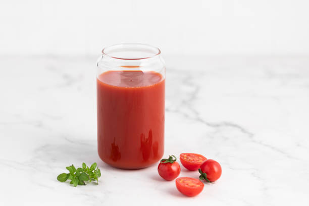 istock tomato juice in a glass 2203033754