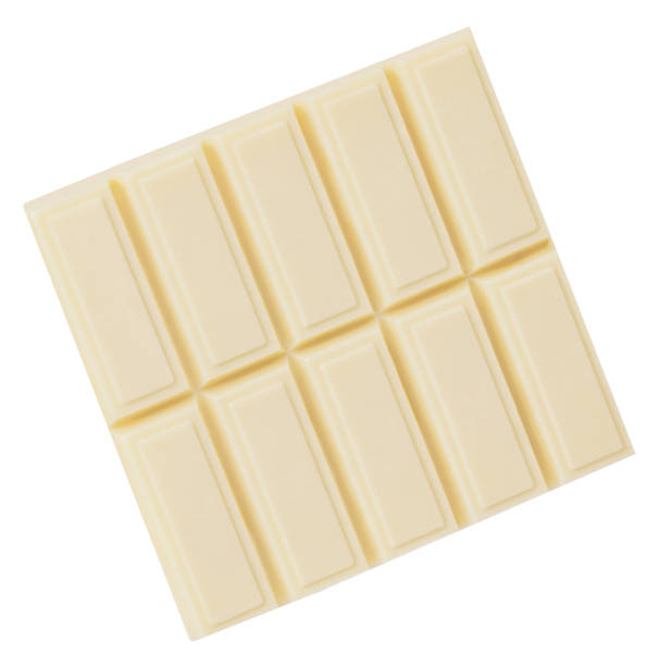 istock Flying White chocolate bar piece isolated. Broken  Milk chocolate chunks on white background. Top view. Flat lay. Package design element 2203034870