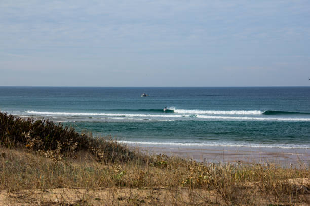 istock Great surfer maneuver in an amazing setting 2203035988