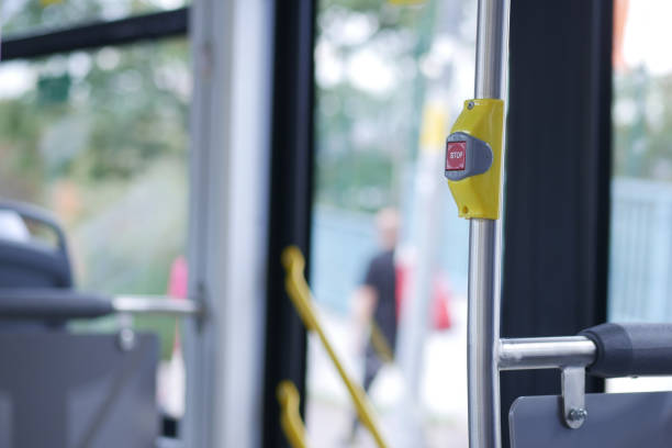 istock Closeup of Bus bell switch for stop inside the public bus 2203044941