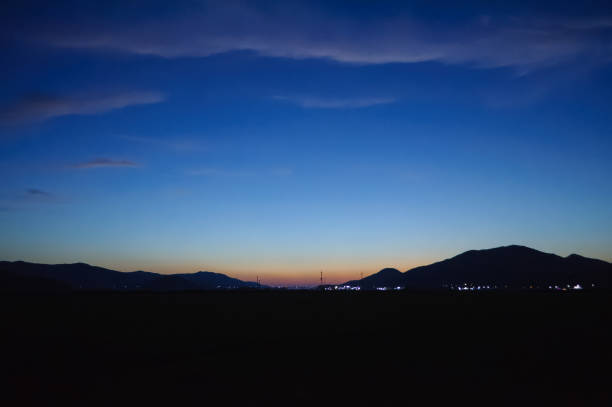 istock a country scene after sunset. 2203045343