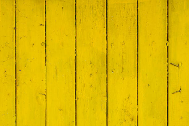 istock Bright yellow painted wooden planks texture 2203050684