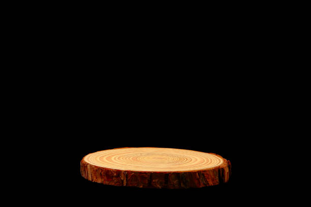 istock Wooden place mat isolated on black background close-up view 2203050886