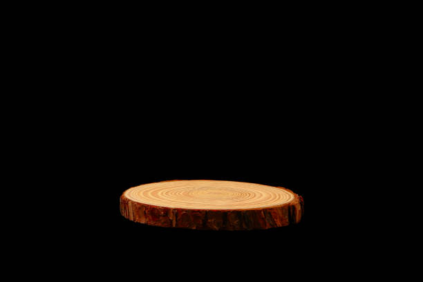 istock Wooden place mat isolated on black background close-up view 2203051098