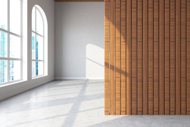 istock Empty Large Room with Sun Beam and Wooden Wall 2203054663