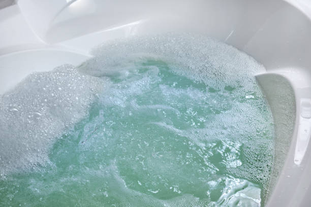istock Surface bubbling water in a home hot tub without people. 2203058299
